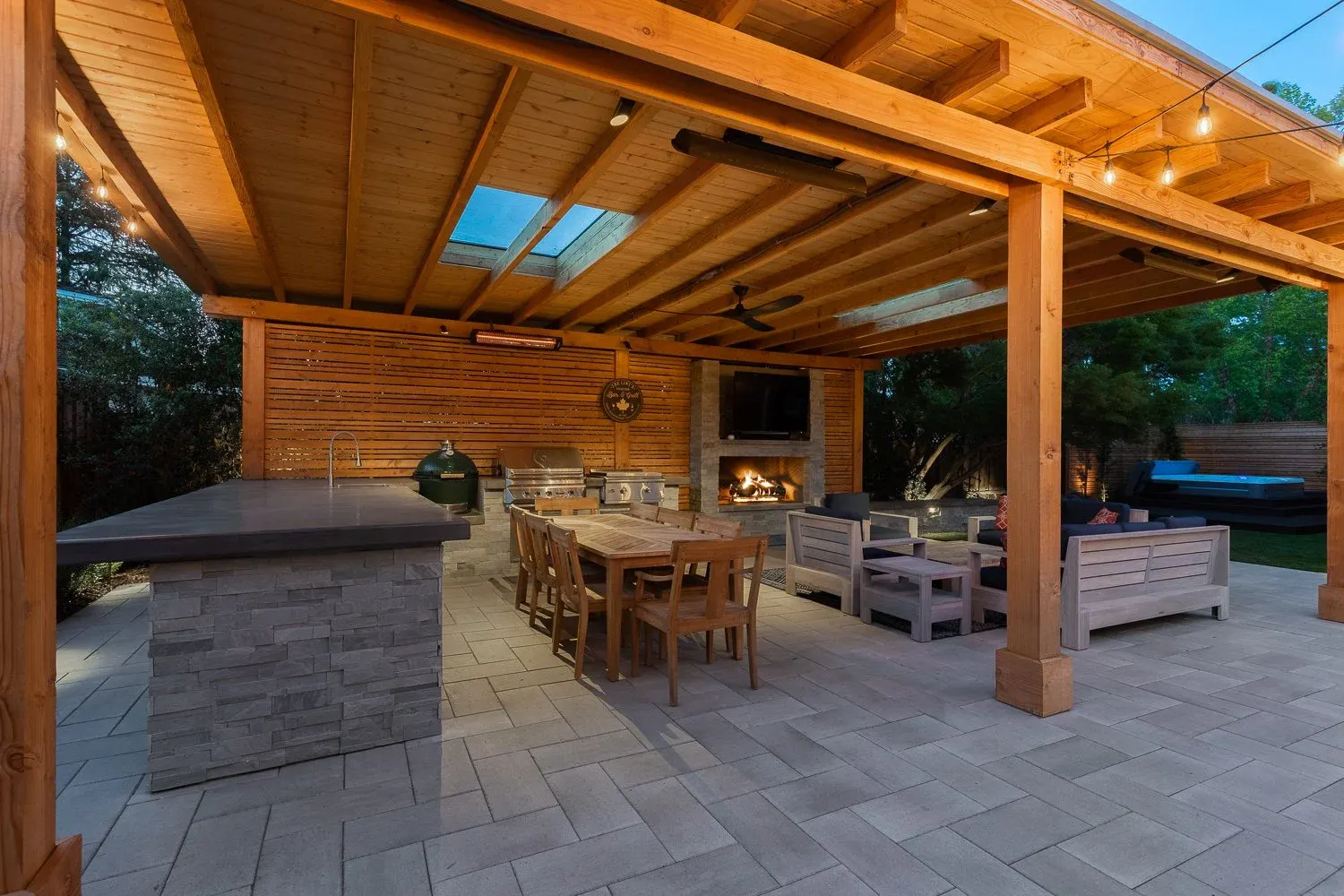 Covered outdoor dining room with a bar