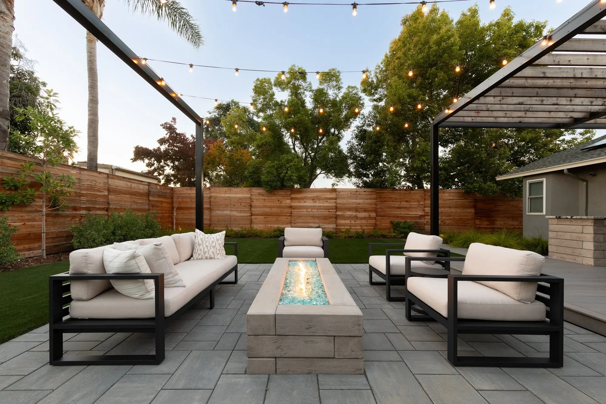 Fire table under string lights