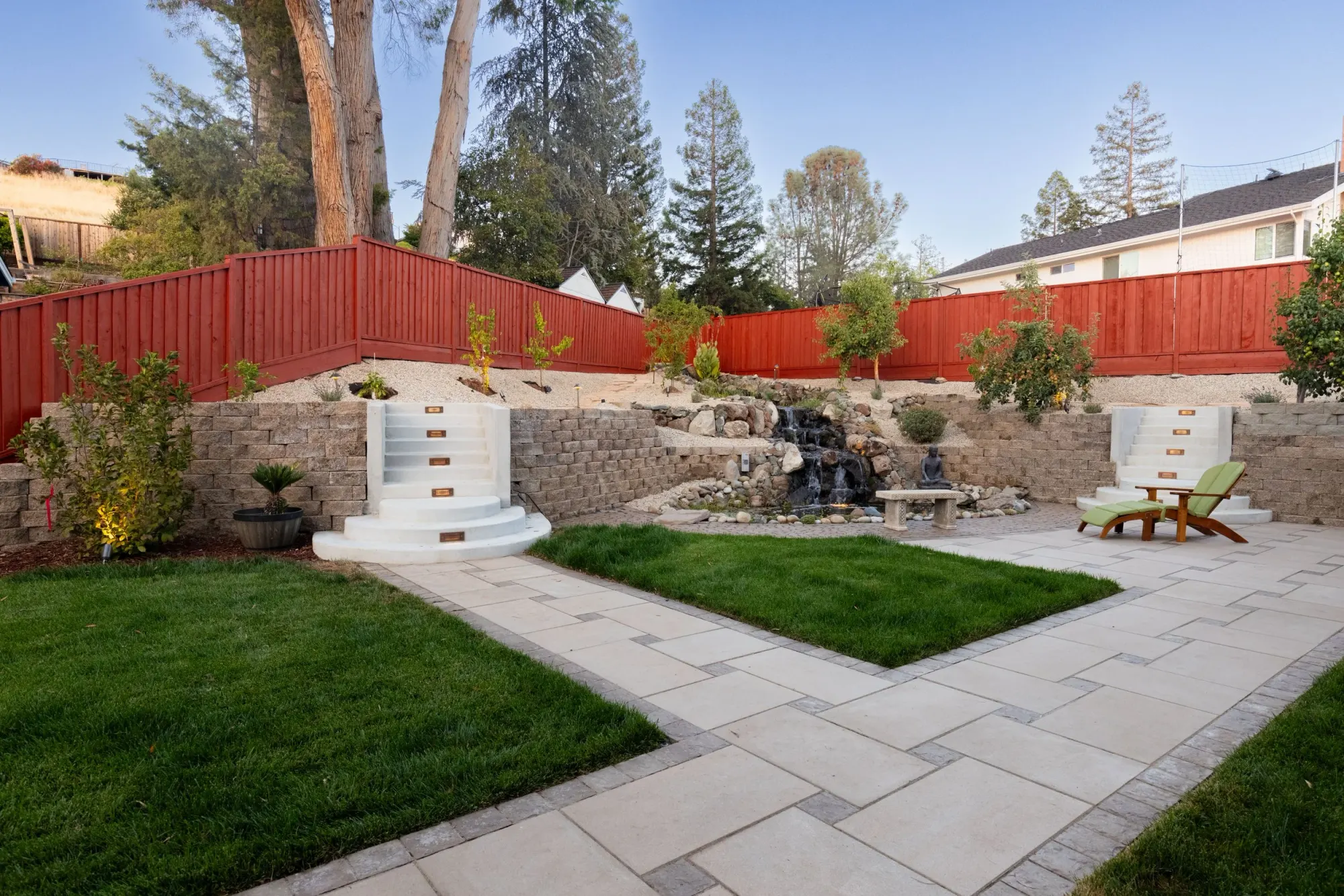 Lawn below terraced planting beds