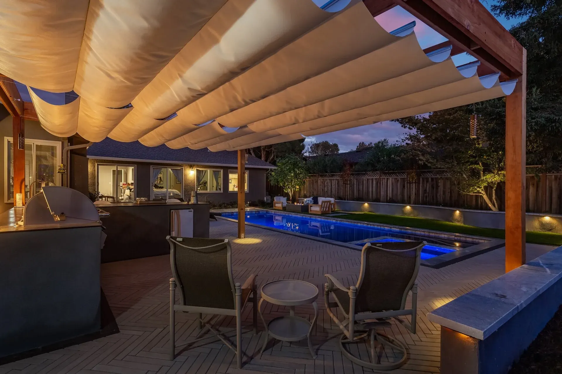 Pool deck under a shade canopy