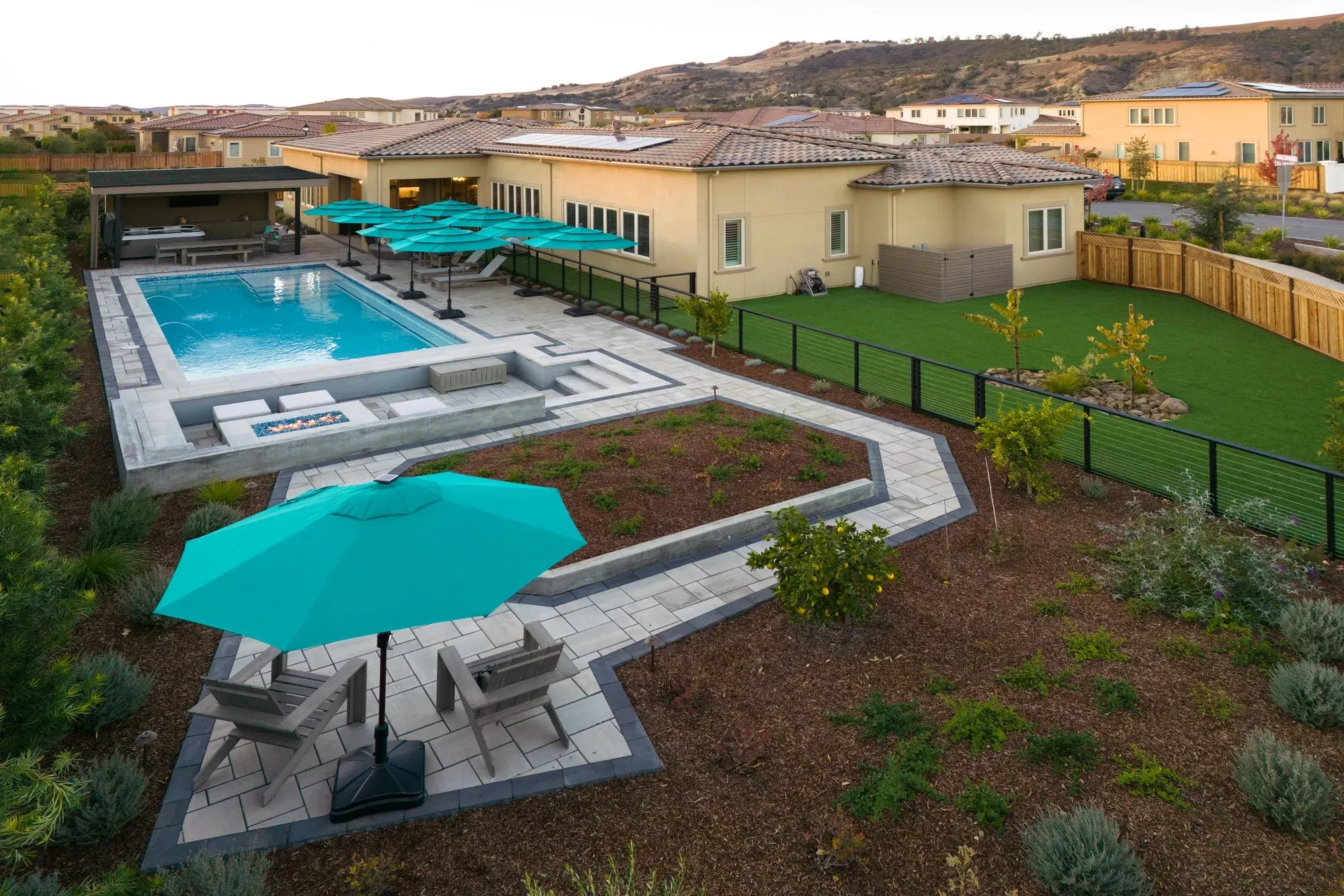 A whole pool yard and its planting seen from above